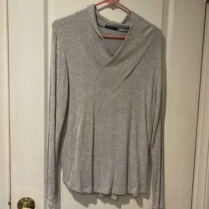 Tags cut out but fits like a medium.